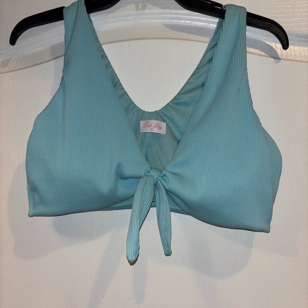 Pink Lily Light Blue Bikini Top flawed, pull on fabric shown in pictures